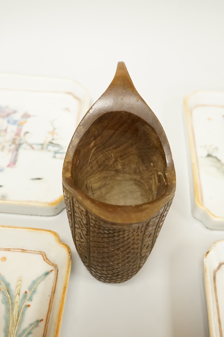 A set of four Chinese famille rose square dishes, late 19th century, and a carved wood pouring vessel, dishes 13.5cm square